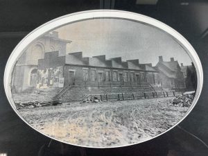 Picture of Delaware County Courthouse Circa 1869 Foreground - County row of offices Background - Courthouse under Construction